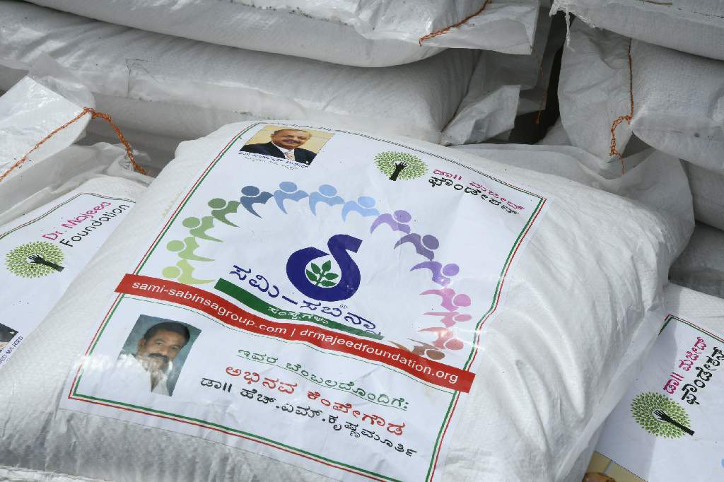 Dr. Majeed Foundation distributes rice bags to the needy communities in Magadi, Karnataka